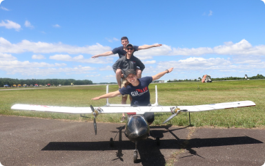 Members of the CU Air team pose with their aircraft